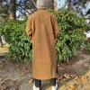 person wearing gent's brown phiran 